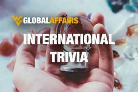 WVU Global Affairs International Trivia with image of hands holding a crystal globe.