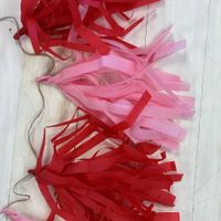 Pink and red tassle garland
