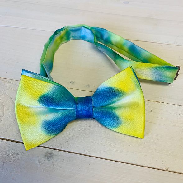 blue and gold tie dyed bow tie