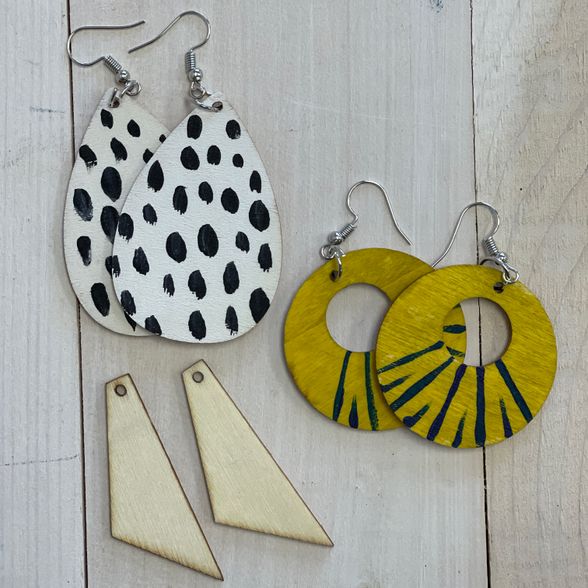 painted earrings in various shapes and colors