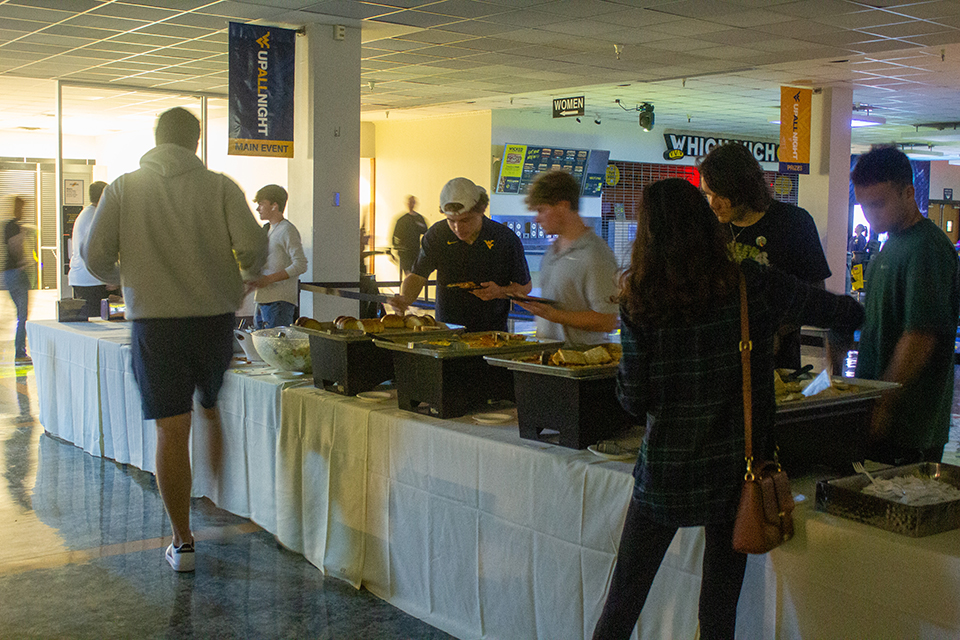 Students make their way through the buffet line during WVU Up All Night