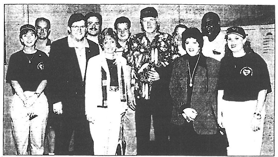 Photo of Mountaineer Parents Club staff with the Beach Boys in 1998