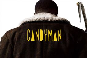 Back view of male with the word candyman on his jacket