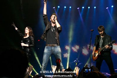 Hillary Scott, Charles Kelley and Dave Haywood on stage at the Coliseum in 2011