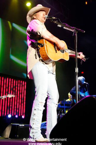 Alan Jackson sings while playing guitar in 2009