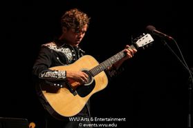 Christian Lopez performing at the WVU Creative Arts Center. Photo by Logan McMasters.