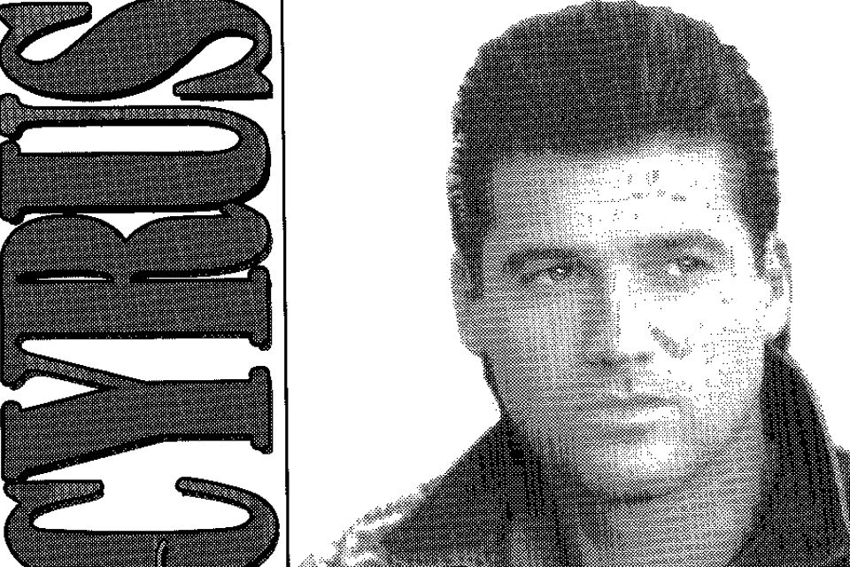Black and white photo of Billy Ray Cyrus from 1994 with the text "Cyrus"