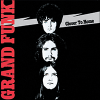 Album cover for Closer to Home with Grand Funk in red and photos of the three band members
