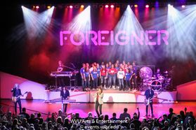 The Morgantown High School Choir and Foreigner performing at the WVU Creative Arts Center.
