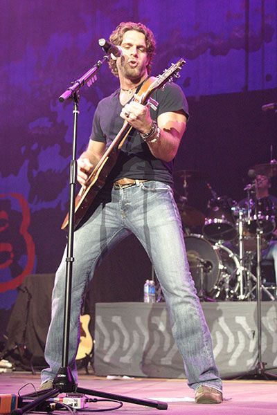 Billy Currington plays guitar and sings at the Coliseum in 2006