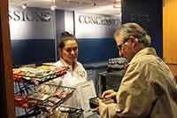 A&E Merchandise Seller assisting a customer