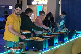 students serving themselves food from the buffet line during WVUp All Night