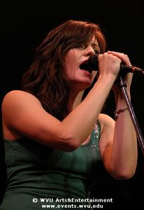 Brett Anderson, member of The Donnas, singing at the Coliseum in 2005