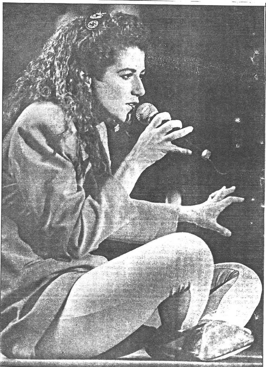 Photo from the Dominion Post. Amy Grant on stage in 1991