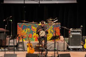 Chris Haddox performs on the Lyell B Clay Theatre stage at the WVU Canady Creative Arts Center. Photo by Chase Hughart.