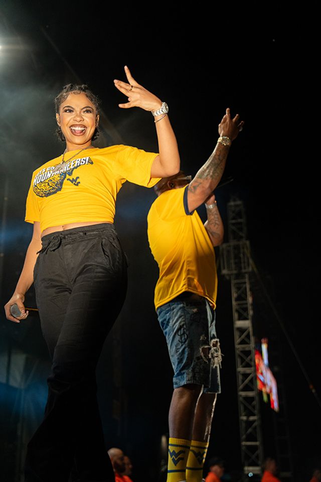 One of Flo Rida's dancers energizes the crowd at FallFest 2023. Photo by David Ryan.