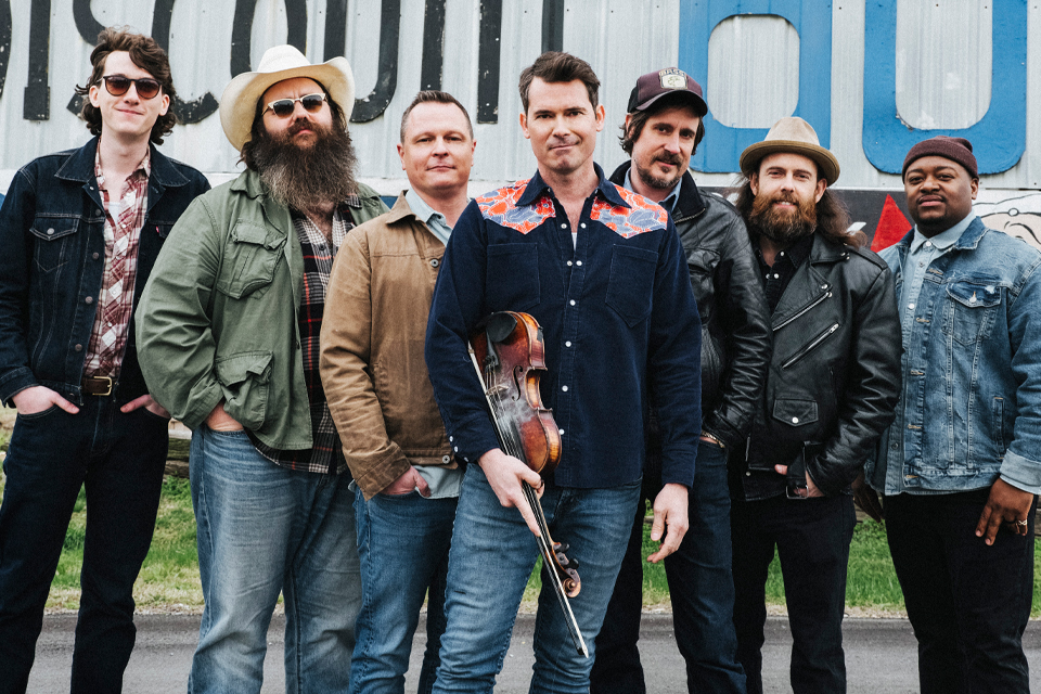 members of the band Old Crow Medicine Show pose for a publicity photo. Photo by Joshua Black Wilkins.