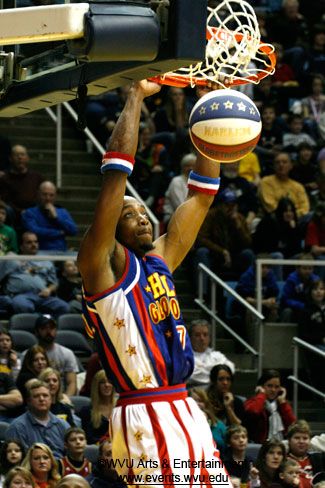 Globetrotters player dunks the ball at the Coliseum in 2010