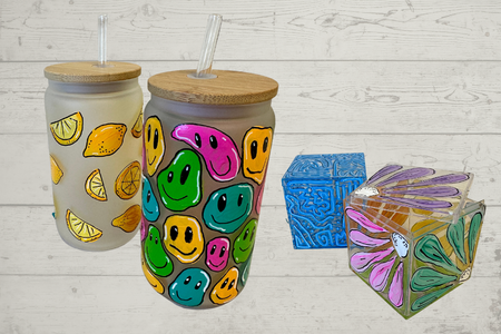 drinking glasses with wooden lids and straws. Acrylic boxes.