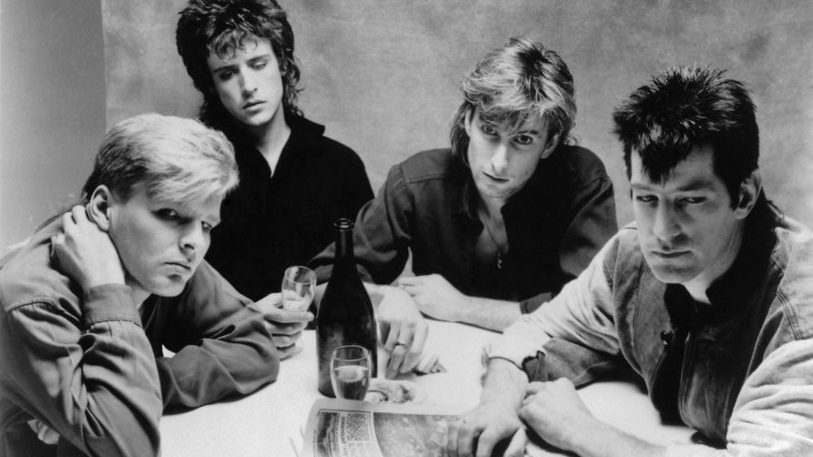members of The Fixx in a publicity photo from 1986